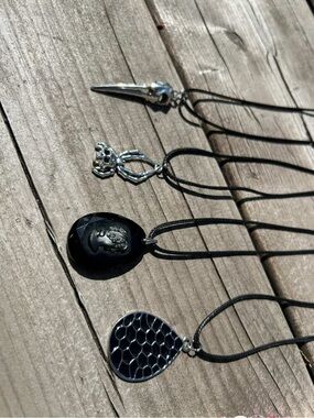 Set of Four Black Pendant Necklaces - Silver Accents
